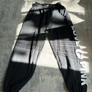PINK black sweatpants with writing on side and pink heart